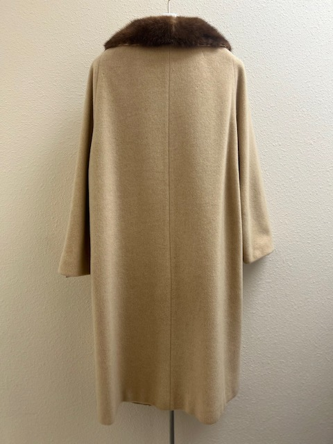 Back view of vintage cream wool coat with brown mink fur collar