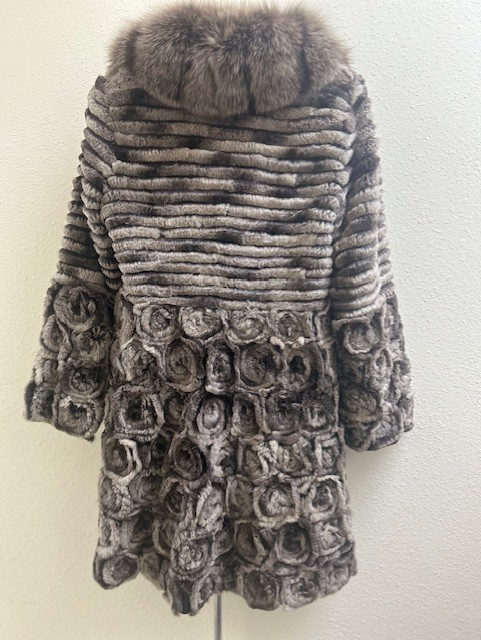 Rabbit swing coat with sable collar — back view showing rosette skirt and ribbed bodice