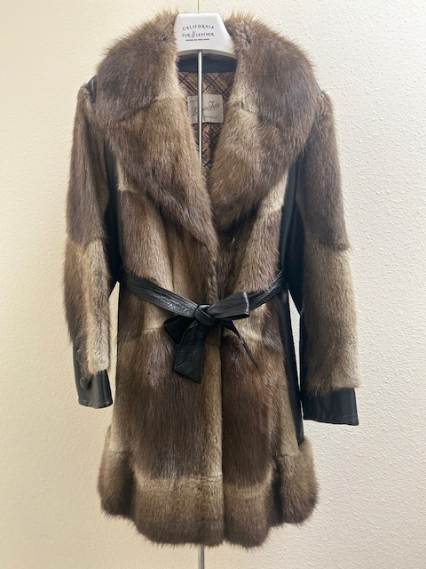 Hopper's Furs natural muskrat and leather coat — front view with belt