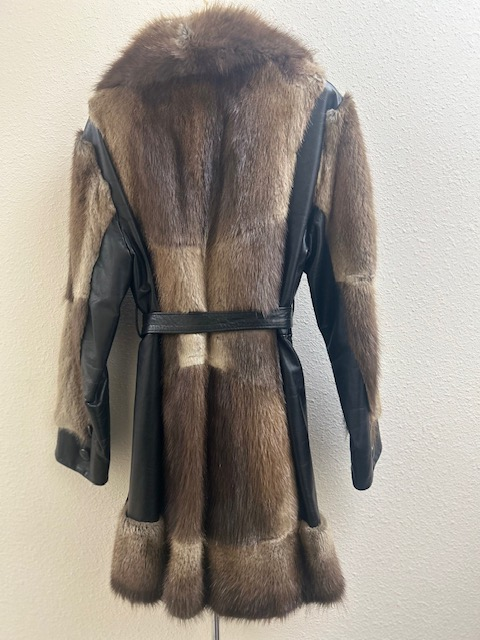 Hopper's Furs natural muskrat and leather coat — back view