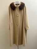 Front view of vintage cream wool coat with brown mink fur collar