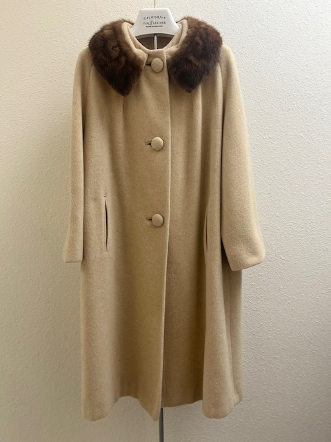 Front view of vintage cream wool coat with brown mink fur collar