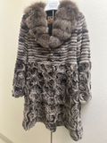 Rabbit swing coat with sable collar — front view showing rosette skirt and ribbed bodice