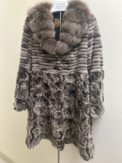 Rabbit swing coat with sable collar — front view showing rosette skirt and ribbed bodice